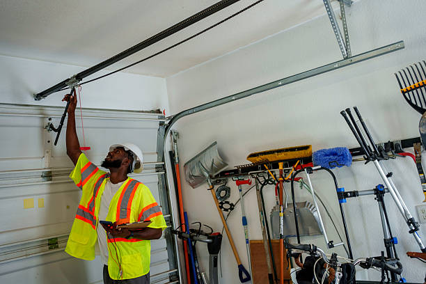 Professional Garage Door Panel Replacement technician working in Fredonia, WI